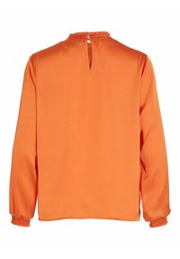 Oranssi pitkähihaisen puseron, sileä kangas, kerätty kaula-aukko, avaus selässä, joustavat hihansuut ja suora helma.