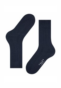 Marineblaue Socken aus einem weichen Material, mit gerippten Akzenten an der Oberseite, einer glatten Textur und dezentem Branding entlang der Unterseite.
