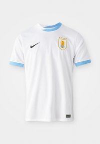 Hvid Nike fodboldtrøje med lyseblå detaljer på krave og ærmer. Har et badge med et våbenskjold og tre stjerner ovenfor.