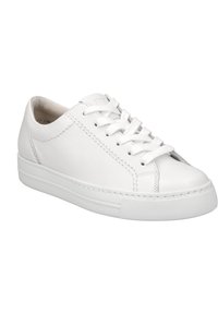 White leather sneaker with rounded toe and textured surface. Features white laces, subtle stitching details, and a rubber sole with grip pattern.