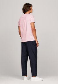 Tommy Hilfiger TOMMY LOGO TEE - T-shirt estampada - light pink