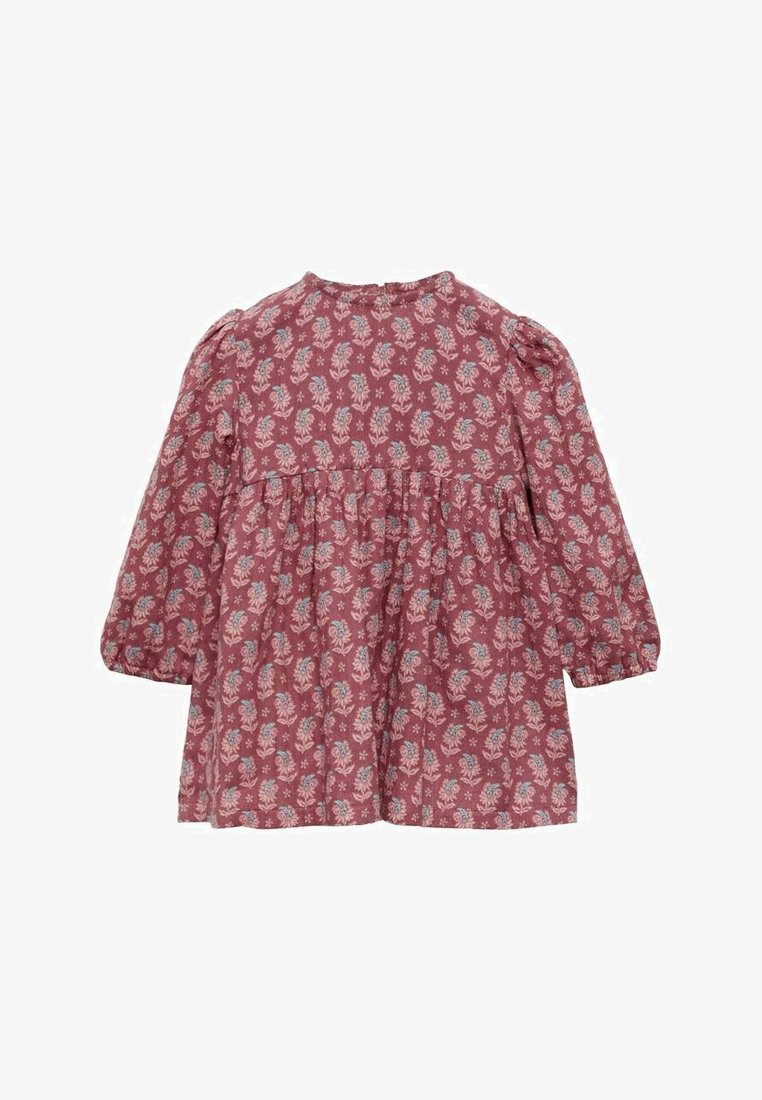 Razbarušena burgundska haljina s dugim rukavima, koja ima cvjetni uzorak u plavoj i bijeloj boji. Tkanina ima mekani osjećaj i skupljenu struk.