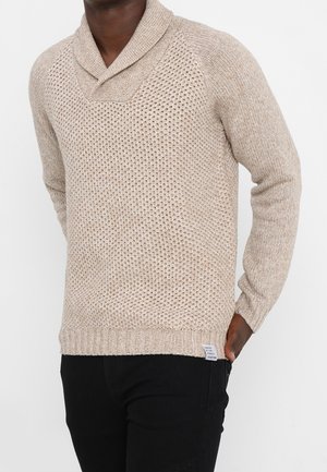 Stickad tröja - beige