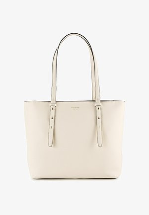 Sac fourre-tout en cuir crème avec deux bretelles d'épaule réglables et petit logo "kate spade new york" au centre avant.