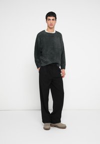 Don't Waste Culture OLENNA UNISEX - Hlače - black