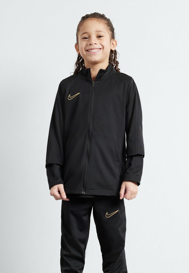 Nike Performance DF ACD23 SUIT UNISEX - Træningssæt - black/metallic gold