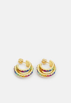 Gold hoop earrings featuring three stacked bands adorned with multicolored gemstones, including purple, green, and blue accents.