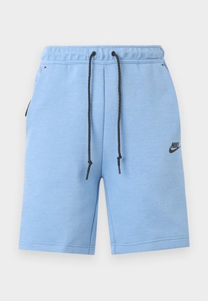 Ανοιχτό μπλε αθλητικό σορτς Nike με μαύρο κορδόνι, ελαστική μέση, πλαϊνές τσέπες και λογότυπο Nike στο αριστερό πόδι.