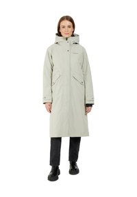 Light green waterproof long coat with a hood, two front pockets, front zipper, and snap closures. Features a relaxed fit and durable fabric.
