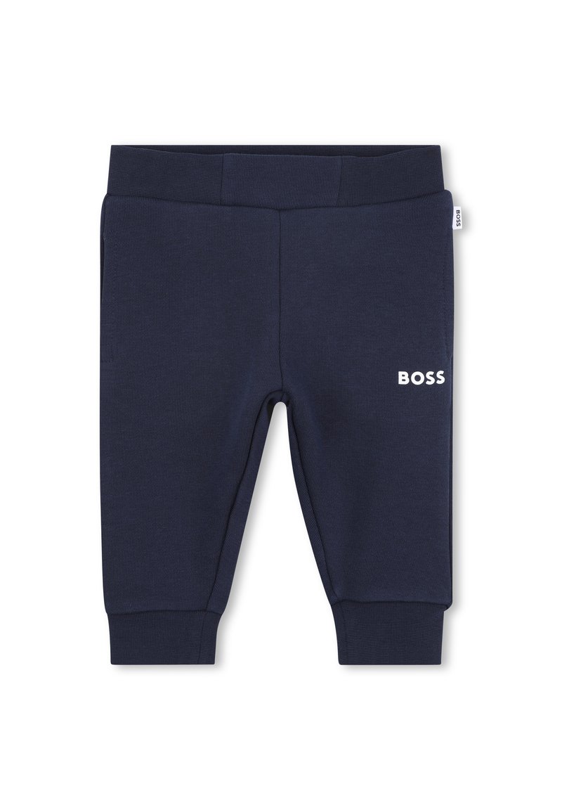 Navy blue sweatpants made of textured fabric, featuring an elastic waistband and "BOSS" logo in white on the front.