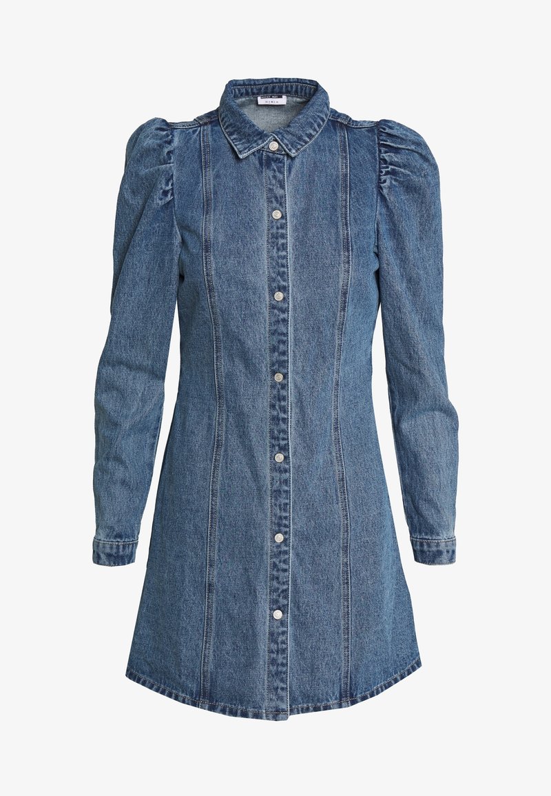 Jeansklänning med krage, puffärmar och framknäppning. Har vertikala sömmar och en något utsvängd fåll.