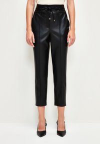 adL Tygbyxor - black