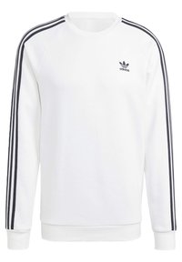 Biały sweatshirt Adidas z czarnymi, trzema paskami na rękawach oraz małym logo Adidas na lewej piersi.