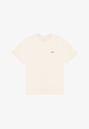 Crèmekleurig T-shirt met korte mouwen en ronde hals, met een kleine zwarte "LES DEUX" tekst op de linkerborst.