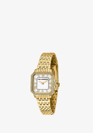 Montre-bracelet Karl Lagerfeld ton or avec cadran carré blanc, chiffres romains, lunette ornée de cristaux et bracelet métal à maillons.