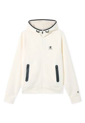 Felpa con cappuccio color avorio con zip e tasche nere con cerniera, coulisse regolabili del cappuccio e piccoli loghi Champion sul petto e sul polsino della manica.