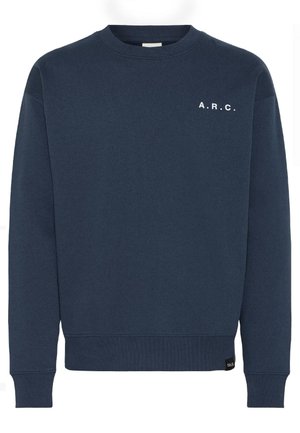 Musta sininen crewneck-huppari, joka on valmistettu pehmeästä kankaasta. Rinnassa on valkoinen "A.R.C."-teksti sekä ribattuja hihansuita ja helmaa paremman istuvuuden takaamiseksi.