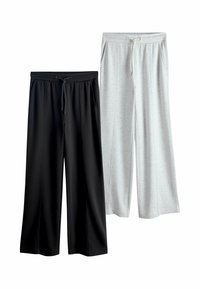 Schwarze und graue Jogginghosen, jeweils mit elastischem Bund, Kordelzug, Seitentaschen und weiten Beinen, aus einem glatten Baumwollmischgewebe.