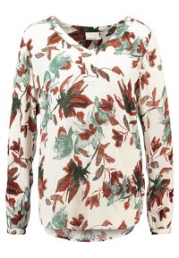 Long-sleeve blouse in lightweight fabric featuring a white base with red and green floral patterns. V-neckline and gathered sleeve cuffs.