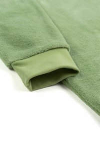Green fleece fabric with a soft texture, featuring a ribbed cuff in matching green. The design is simple, with no visible patterns or hardware.