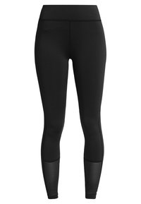 Svarta leggings i elastiskt material, med hög midja och ribbat mönster vid underbenen för extra detalj.