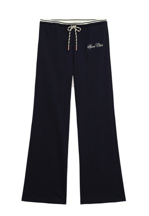 Schwarze weit geschnittene Hose mit elastischem Taillenbund, gestreiftem Kordelzug und "Sport Chic"-Aufschrift auf der oberen linken Seite.