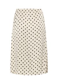 Jupe beige mi-longue aux genoux avec des pois noirs et une ceinture élastique, présentée sur fond blanc.