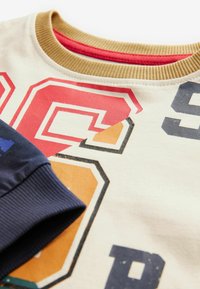 Next REGULAR FIT - Pižamos komplektas - multi bright varsity