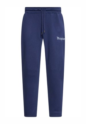 LOGO - Tracksuit bottoms - blackiris