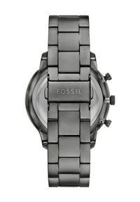 Men's silver-toned stainless steel watch with a link bracelet, round case, and Fossil branding on the side. Minimalist and sleek design.