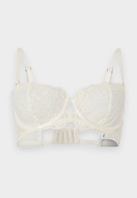 Soutien-gorge à armatures en dentelle ivoire avec broderie florale, bretelles réglables et plusieurs agrafes au dos.