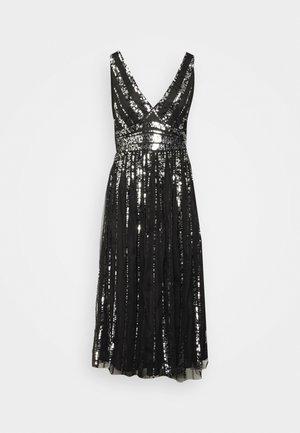 Robe midi noire sans manches à col en V avec sequins argentés verticaux et ceinture ajustée.