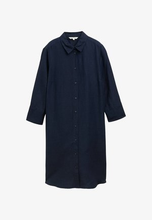 Marineblauwe linnen overhemddress met lange mouwen, knoopsluiting aan de voorkant en klassieke kraag. Heeft een losse, ontspannen pasvorm met zijopeningen.