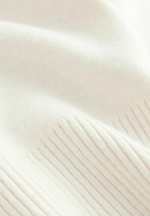 Weiches, cremiges weißes Material mit subtiler gerippter Textur und sanften Falten, die Wärme und Komfort suggerieren.