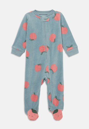 Light blue fleece onesie with pink peach patterns, front zipper, and peach-shaped foot accents with smiling faces. Long sleeves and cuffed wrists.