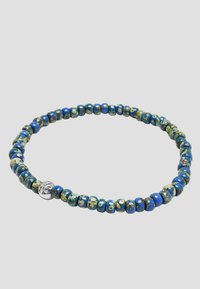 Beaded necklace featuring round blue and green beads with metallic accents. Includes a small silver charm with a symbol.
