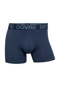 Mørkeblå bomuldsstræk boxershorts med en logo-beklædt talje, der pryder ordet "DOVRE" i lyseblå. Mid thigh længde og tætsiddende pasform.