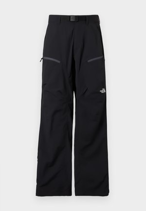Pantalon de plein air noir avec ceinture ajustable, deux poches cuisses zippées et le logo The North Face sur la jambe droite.