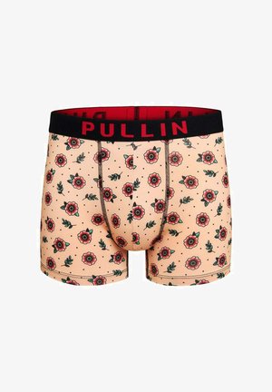 Boxer beige avec motif floral rouge et noir et ceinture noire arborant le texte rouge "PULLIN."