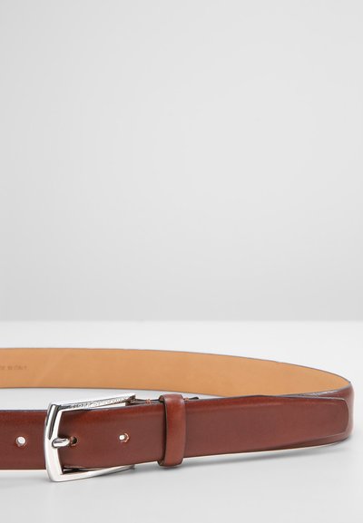 Brown leather belt with a smooth finish, silver metal buckle, and a single loop. Interior is tan leather with a subtle embossed detail.