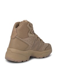 Tan high-top athletic shoe, featuring mesh and suede materials, reinforced heel, textured accents, and a rubber outsole for traction.