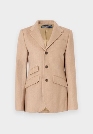 Beiger Fischgrät-Blazer mit Reverskragen, drei Knöpfen und zwei Fronttaschen. Das Innenfutter ist hellbraun.