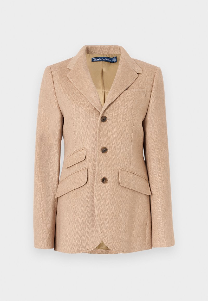 Blazer beige a spina di pesce con colletto a revers, tre bottoni e due tasche frontali. La fodera interna è di colore marrone chiaro.