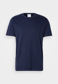 T-shirt de gola redonda de manga curta azul marinho, com design simples, em tecido de algodão leve, apresentado sobre um fundo claro e neutro.