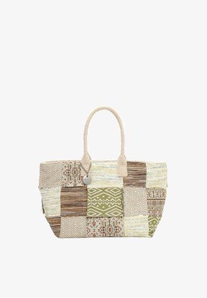 Sac fourre-tout avec un design en patchwork tissé dans des tons beige, marron, olive et crème, présentant des motifs géométriques et tribaux, avec deux poignées en tissu.