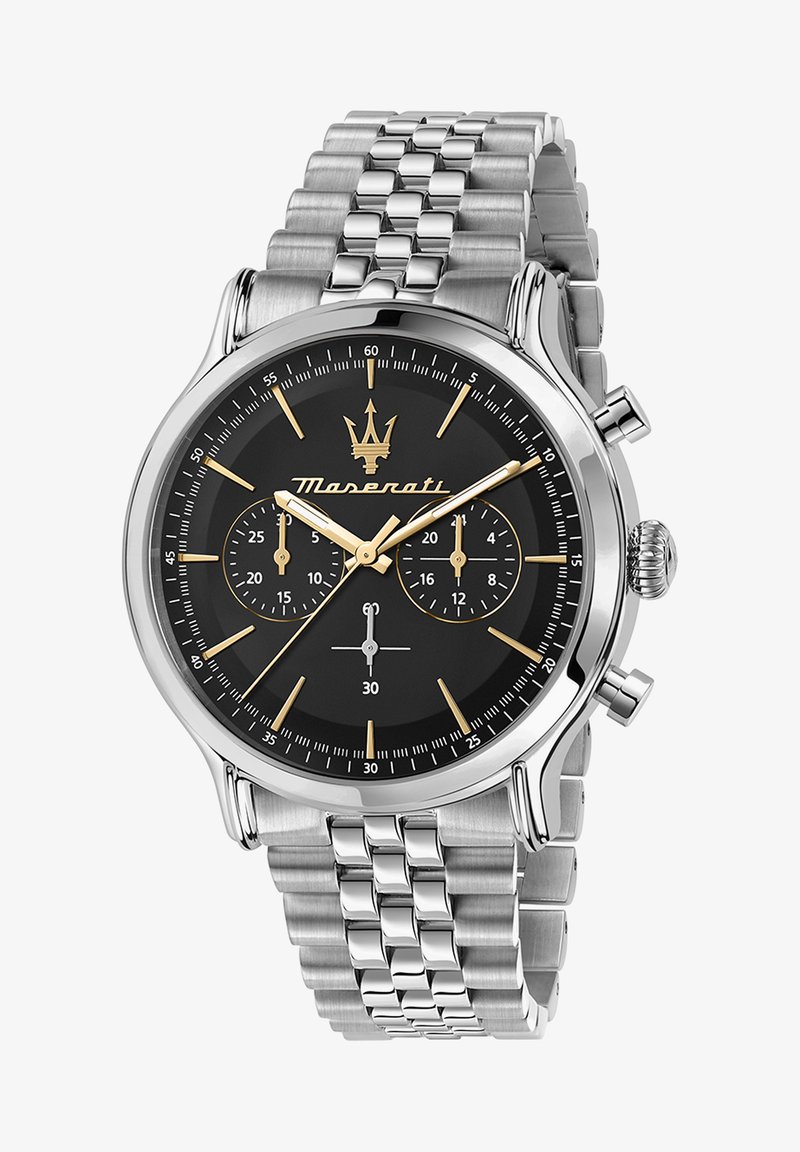 Rustfrit stål ur med sort skive, gyldne detaljer, chronograph-funktioner, sølvmaske-bånd og en poleret urkasse. Har tre underskiver.