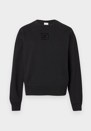 Sweatshirt noir en coton, avec un col rond, des manches longues, des poignets côtelés et un logo carré texturé sur la poitrine.