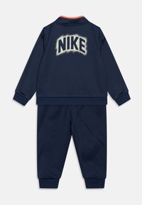Nike Sportswear POWDER PLAY PROPUS SET - Spordijakk - midnight navy