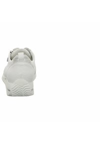 White sneaker with textured leather upper, pull tab, and zip closure. Features a thick rubber sole with a zigzag pattern for traction.