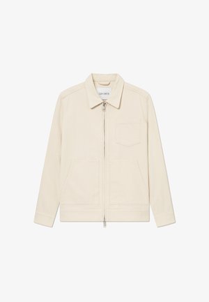 Beige cotton jacket featuring a zip front, a classic collar, two front pockets, and a left chest pocket. Smooth texture with subtle stitching.